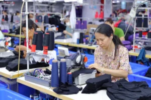 High-end custom pajamas manufacturing showcasing luxury French seams, contrast piping, and premium sleepwear stitching.