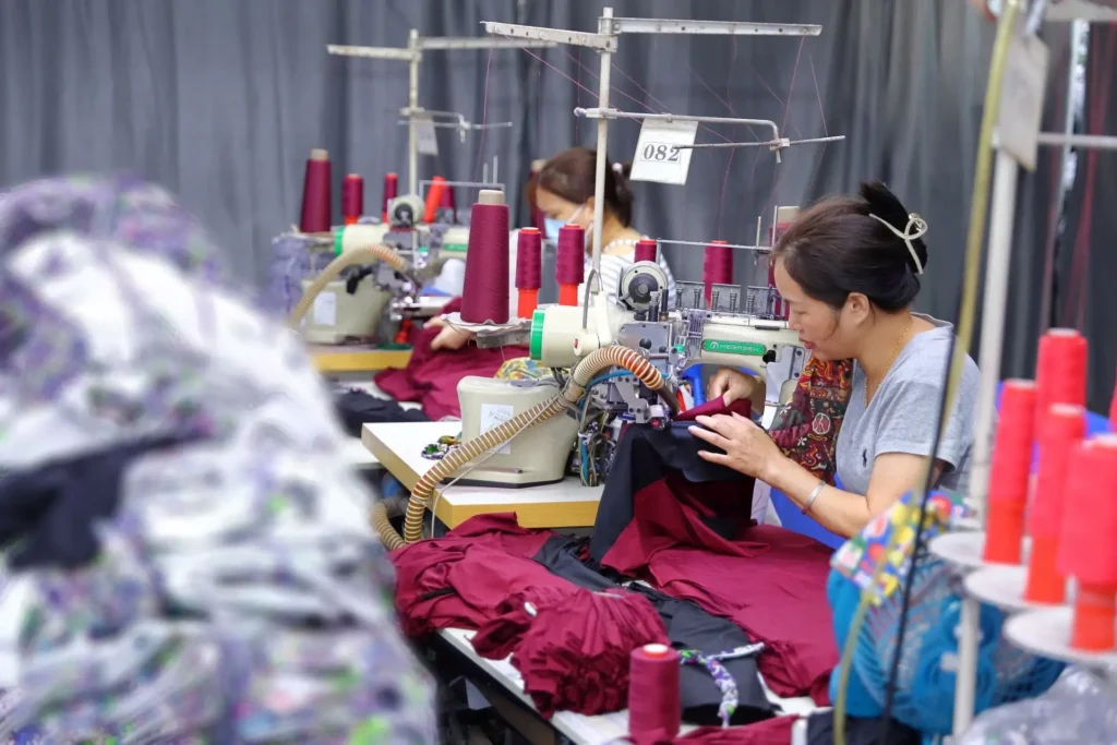OEKO-TEX Standard 100 certified clothing manufacturer conducting laboratory chemical testing on premium garments to verify consumer textile safety.